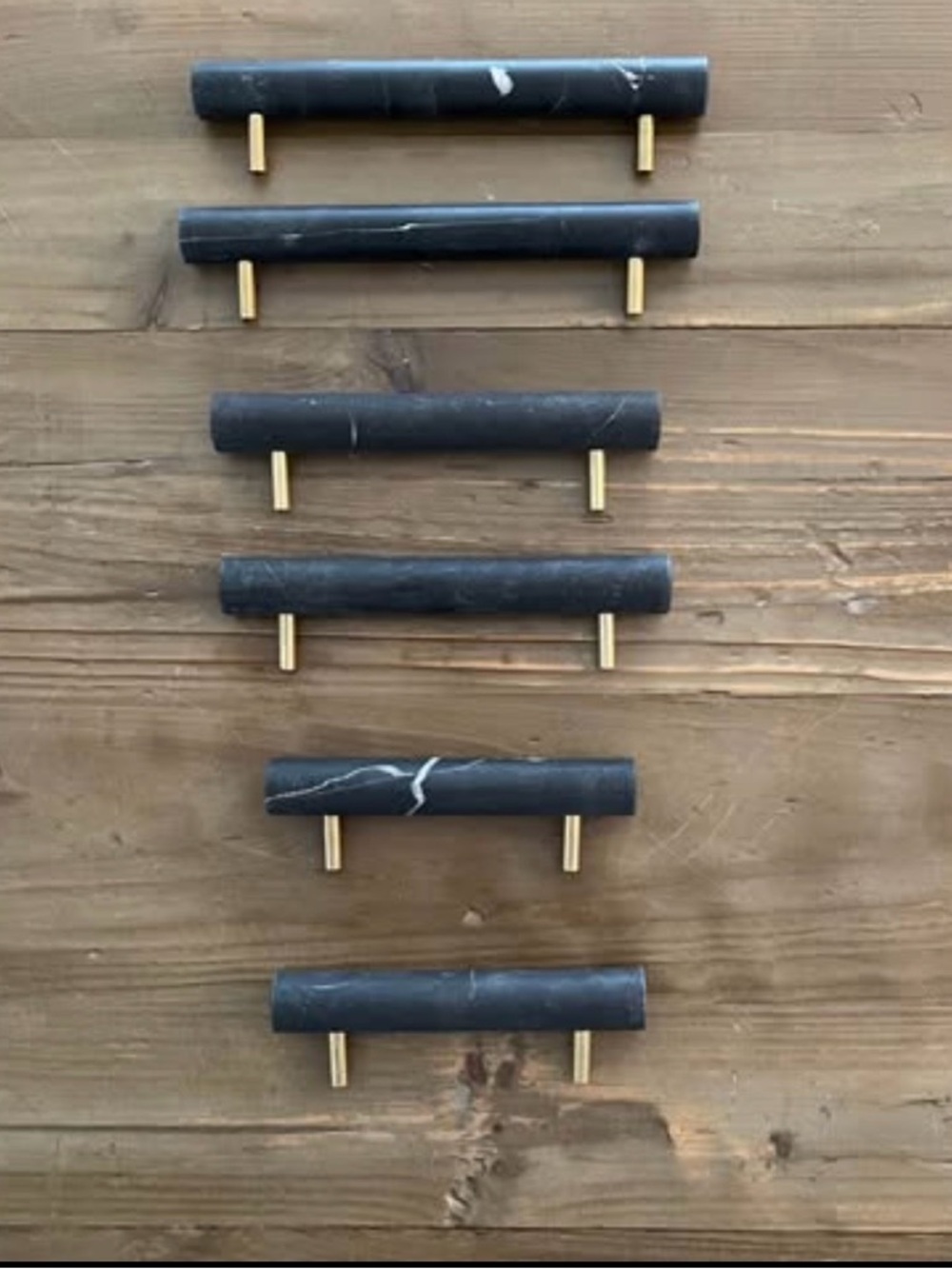 Set of 6 CB2 honed black marble and brass drawer pulls